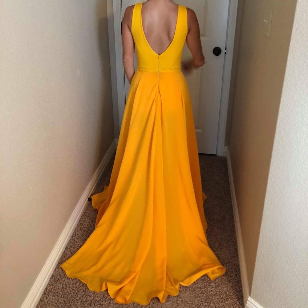 Yellow gown .